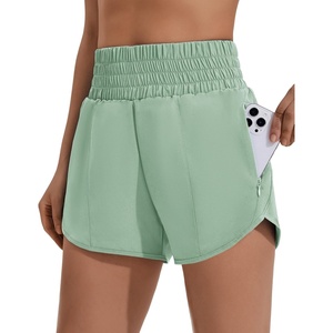 image:imagePINSPARK Women 3 High Waisted Running Shorts Athletic Workout Short Quick Dry Mesh Liner Dolphin Shorts with 2 Zip PocketsGreen Mist
