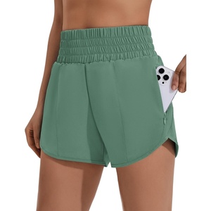 image:imagePINSPARK Women 3 High Waisted Running Shorts Athletic Workout Short Quick Dry Mesh Liner Dolphin Shorts with 2 Zip PocketsMedium Forest