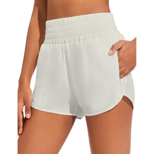 image:imagePINSPARK Women 3 High Waisted Running Shorts Athletic Workout Short Quick Dry Mesh Liner Dolphin Shorts with 2 Zip PocketsWhite