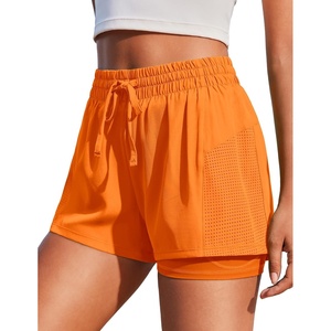 image:imagePINSPARK Womens 2 in 1 Running Shorts with Liner Pockets Quick Dry Athletic Workout Gym ShortsOrange