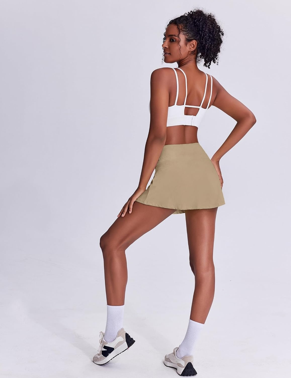image:imagePINSPARK Tennis Skirts for Women Pleated Athletic Skort Lightweight Golf Skirts with Shorts Pocket Workout PickleballKhaki