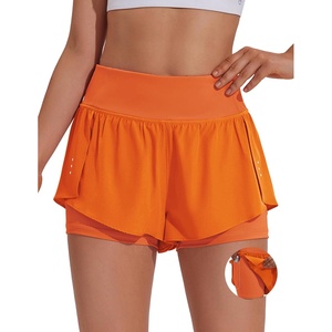 image:imagePINSPARK 2 in 1 Athletic Shorts for Women Biker Underneath Running Shorts High Waisted Gym Workout Short with Side PocketsVibrant Orange